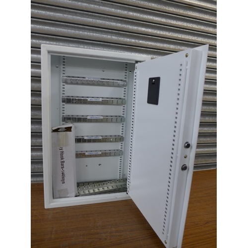 2300 - A Phoenix Safe Company Limited 66cm x 43cm x 13cm metal key safe with instruction booklet, spare key... 