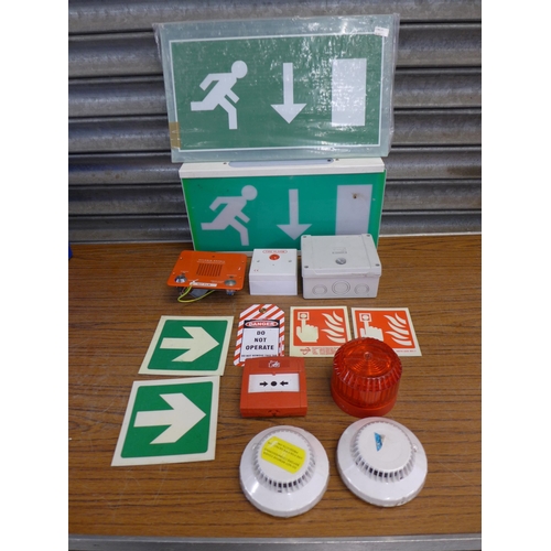 2318 - A box of assorted fire alarm equipment including a fire escape light up sign and other fire escape s... 