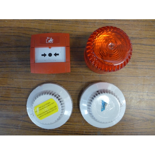 2318 - A box of assorted fire alarm equipment including a fire escape light up sign and other fire escape s... 