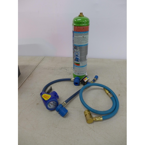 2335 - An Exchill auto air conditioning recharge bottle with hoses