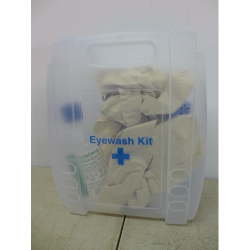 2339 - A box of first aid kits and workwear clothes