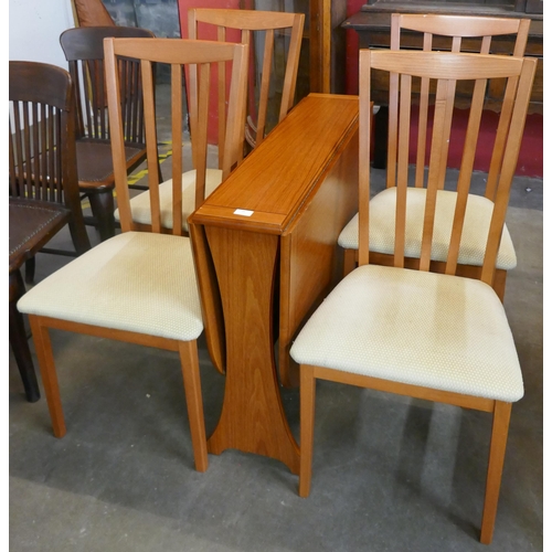 34 - A Morris of Glasgow teak drop-leaf table and four chairs