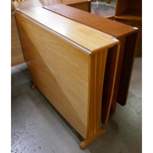 58 - A Jentique teak drop-leaf table and one other