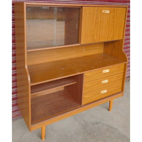 70A - A simulated teak highboard