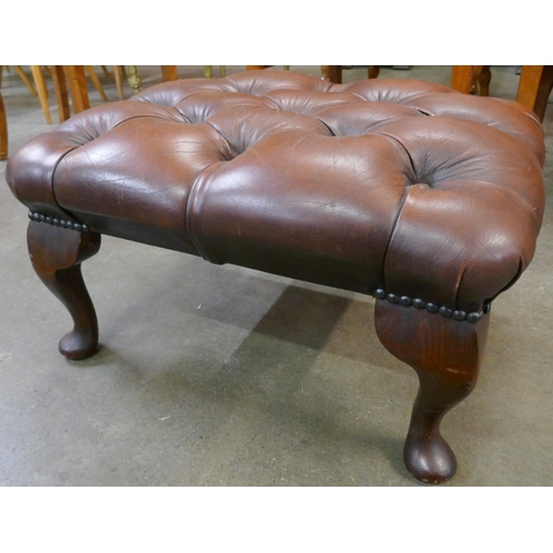 78 - A brown leather Chesterfield footstool