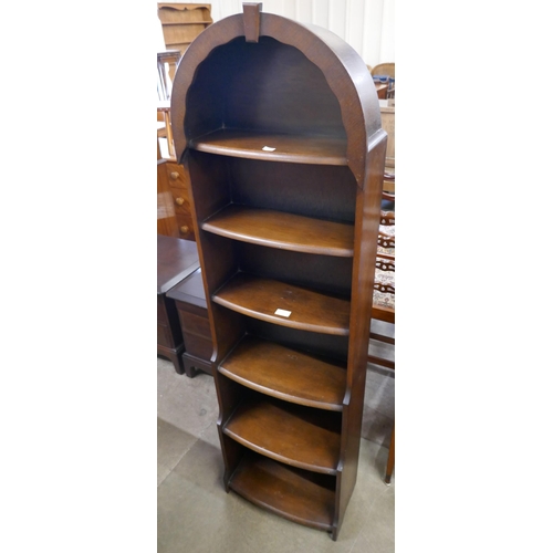 85 - An oak waterfall front open bookcase