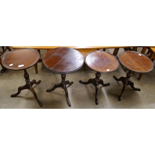 94 - Four Regency style mahogany tripod wine tables