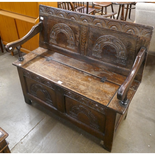 95A - A William III carved oak settle