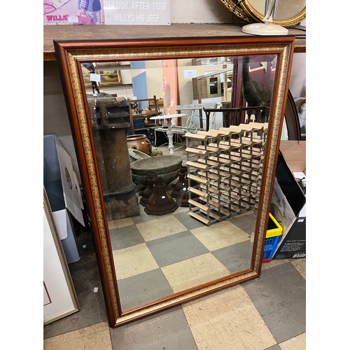 338 - A beech framed mirror