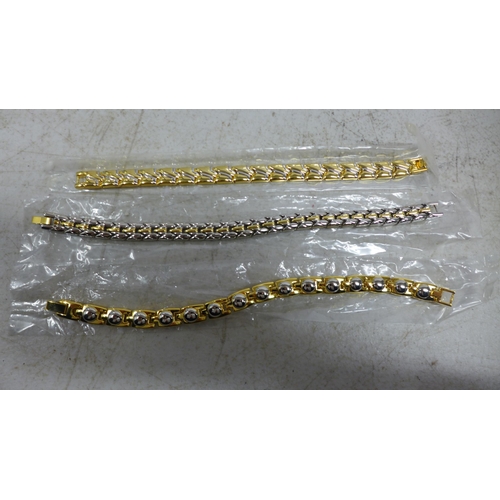 2097 - 20 Assorted gold plated magnetic bracelets