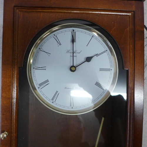 2100 - A long cased wall clock and two barometers