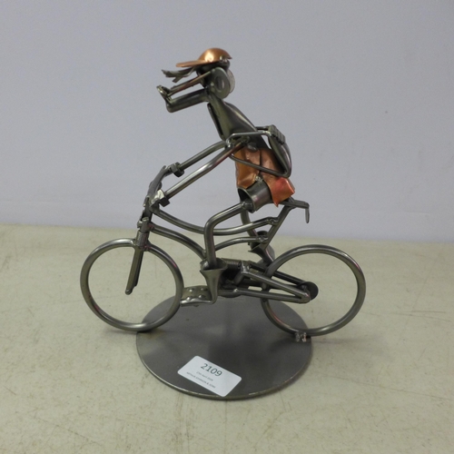 2109 - The Atrium collection metal figurine man on bicycle