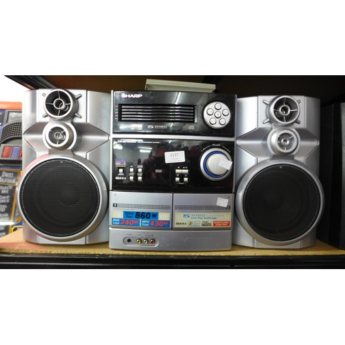 2137 - A Sharp CD-MPX860 5 CD changer mini component hi-fi system with a pair of speakers