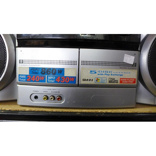 2137 - A Sharp CD-MPX860 5 CD changer mini component hi-fi system with a pair of speakers