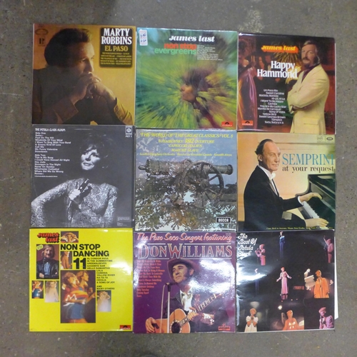 2139 - A large collection of 8 boxes of assorted LP records and 7” singles featuring a wide range of differ... 