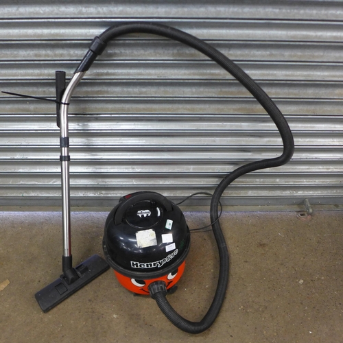 2149 - A Henry Micro Numatic vacuum cleaner with hose, stick and nozzle attachment