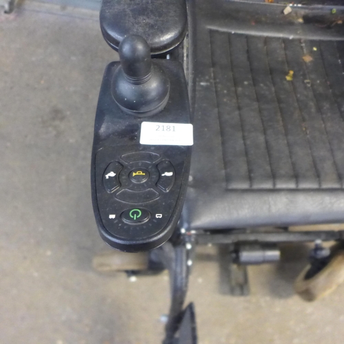 2181 - An Invacare Harrier plus electric wheelchair with boxed Invacare charger