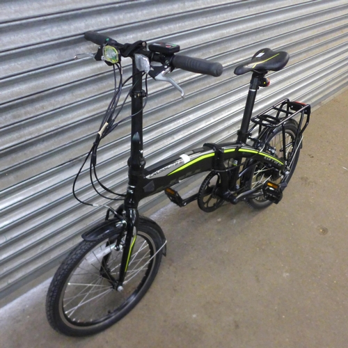 2183 - A Carrera Crosscity E folding aluminium electric bike with charger and key - unused - stood for two ... 