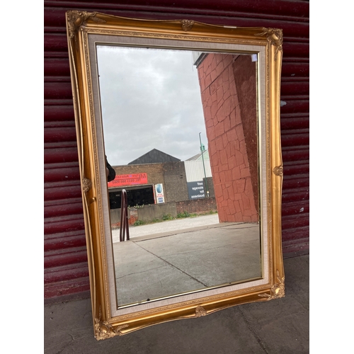 341A - A Victorian style gilt framed mirror