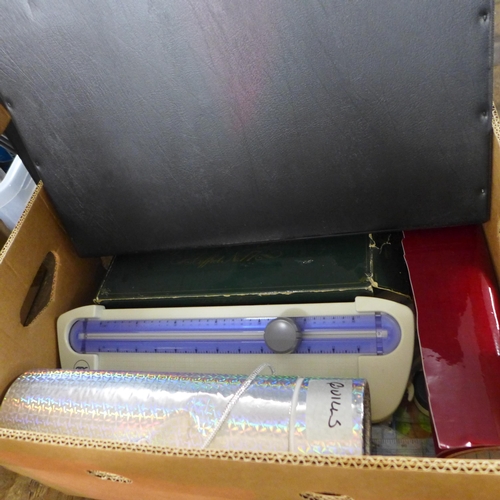 2381 - A box of assorted art supplies and two portfolios of sketch pads, etc.