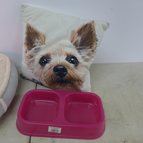 2429 - A collection of assorted pet bowls with dog themed pillow and a small dog bed.