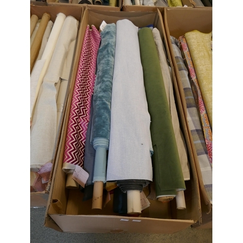 1585 - A box of upholstery fabric part rolls and roll ends