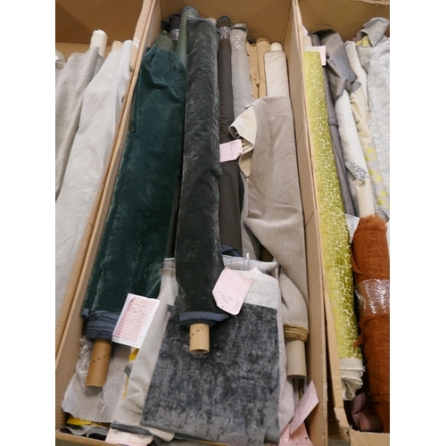 1580 - A box of upholstery fabric part rolls and roll ends