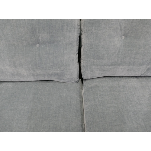 1337 - A steel blue velvet three seater sofa RRP £949