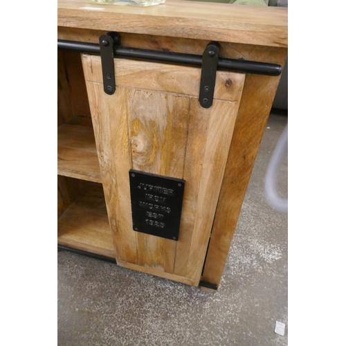 1397 - A wood and metal cabinet with sliding door