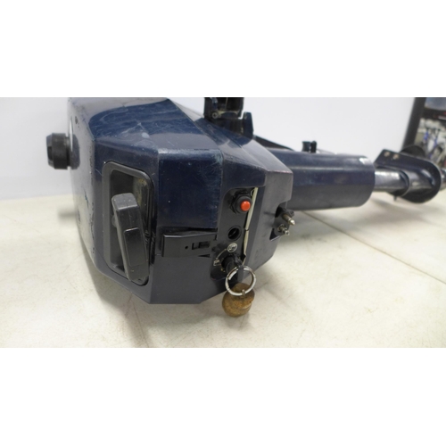 2033 - An Evinrude twin cylinder 3-horse power petrol outboard motor