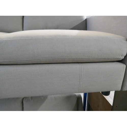 1504 - A pair of mink upholstered three seater sofas