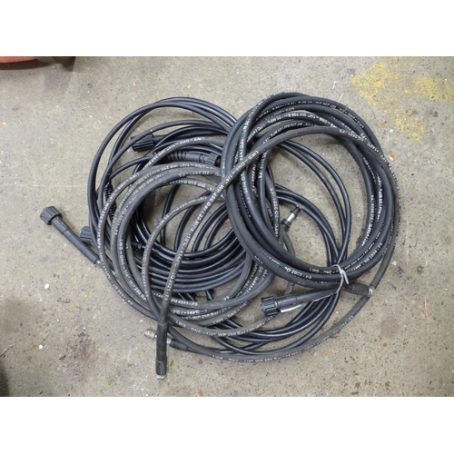 2235 - A large quantity of assorted power wash hoses