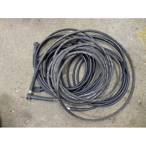 2235 - A large quantity of assorted power wash hoses