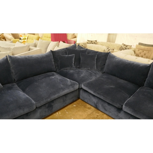 1301 - An ink velvet Grande corner sofa and footstool