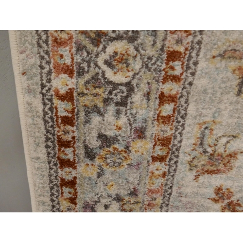 1367 - A multi-coloured ground vintage look carpet, 200 x 300cm