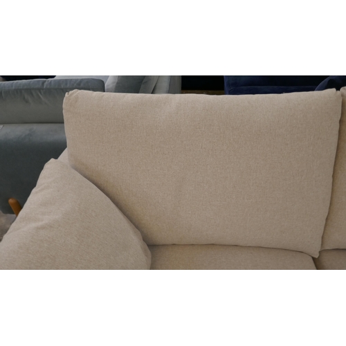 1431 - An oatmeal  upholstered 2.5 seater sofa on semi exposed frame