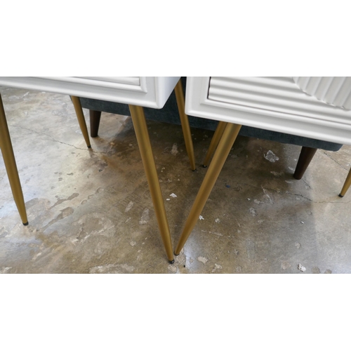 1439 - A pair of white bedside tables with gold legs