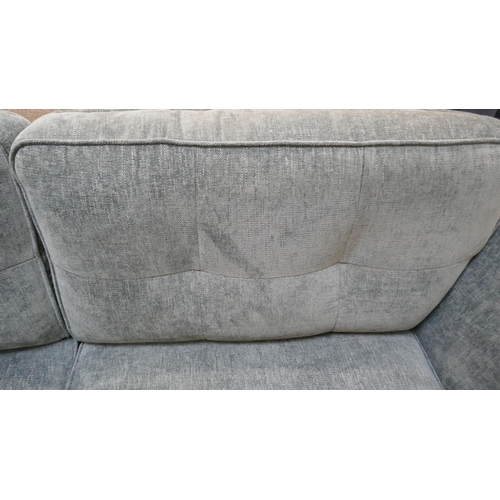 1440 - A dark teal velvet three seater sofa