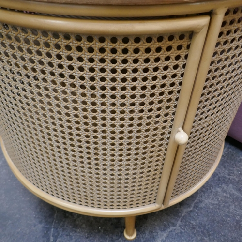 1444 - A wood and rattan style drum table