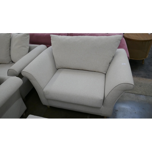 1445 - An oatmeal upholstered three seater sofa, two seater sofa, armchair and footstool