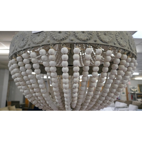 1446 - A large beaded chandelier