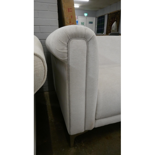 1448 - An oatmeal upholstered two seater sofa