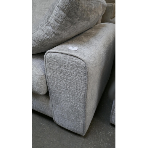 1461 - A pewter velvet four seater sofa