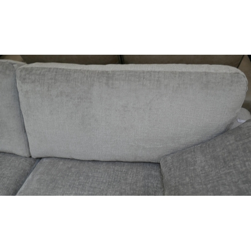 1461 - A pewter velvet four seater sofa