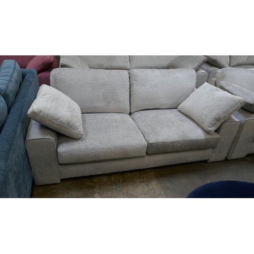 1462 - A pewter velvet three seater sofa