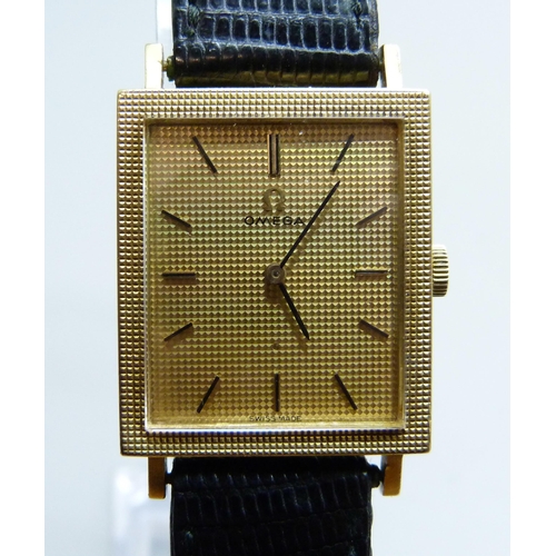 1009 - A gentleman's 18ct gold cased Omega dress wristwatch on a leather watch strap with Omega buckle, 234... 