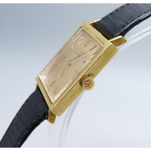 1009 - A gentleman's 18ct gold cased Omega dress wristwatch on a leather watch strap with Omega buckle, 234... 