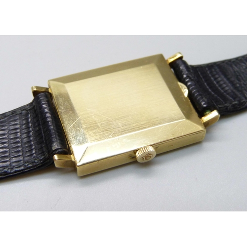 1009 - A gentleman's 18ct gold cased Omega dress wristwatch on a leather watch strap with Omega buckle, 234... 