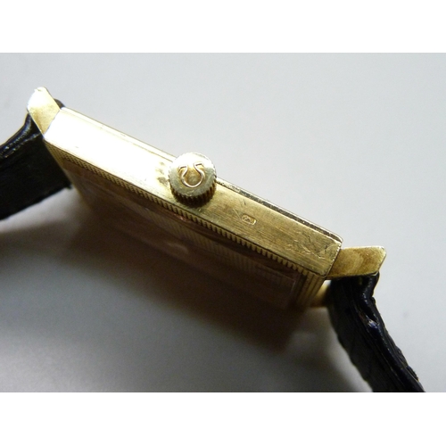 1009 - A gentleman's 18ct gold cased Omega dress wristwatch on a leather watch strap with Omega buckle, 234... 