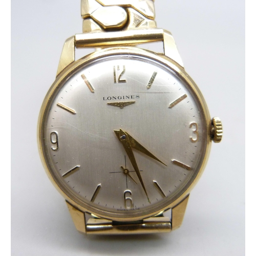 1010 - A 9ct gold cased Longines wristwatch, the case back bears inscription dated 1967, 32mm case